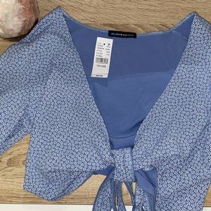 Floral blue tie blouse